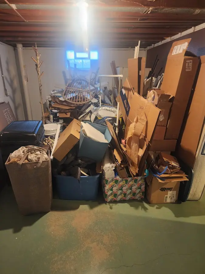 Roll-off dumpster container at job site for 15 Yard Dumpster Rental in Thomson